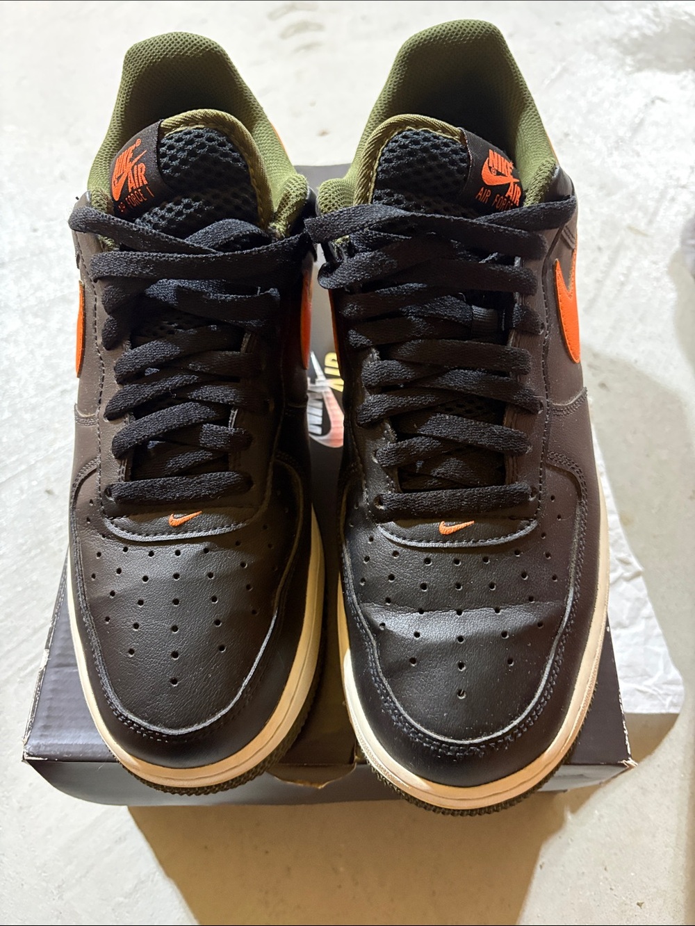 Nike Low-Top Sneakers in Black with Orange Swoosh and Olive Lining